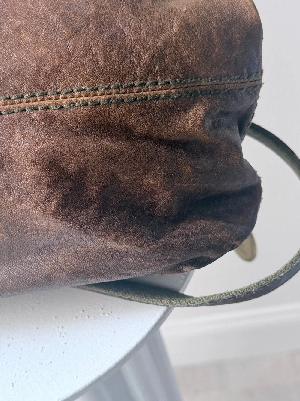Hyper Distressed Fossil Vintage Bag.